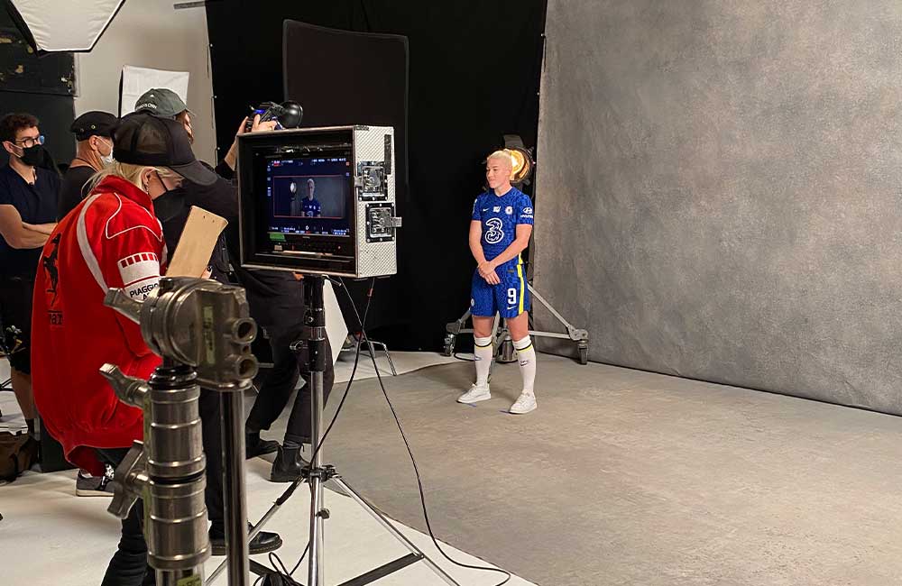 female footballer being filmed